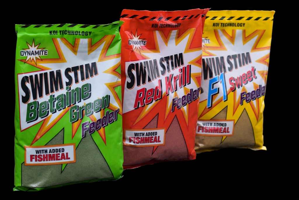 Three Swim Stim Feeder Mix bags against black background
